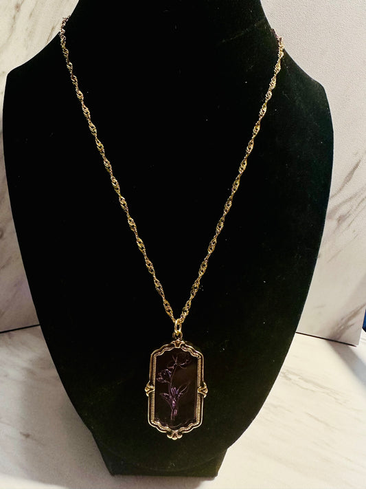 Rose incased pendant and chain.