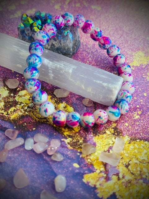 pink and blue paint splatter Glass beads Bracelet